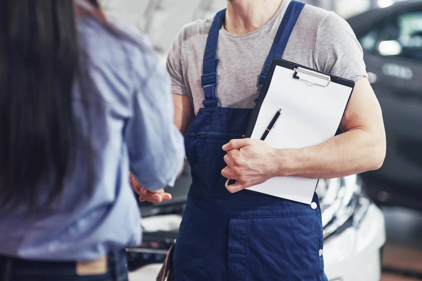 241d912d-3a74-4445-abd5-a85a469d4c65-husband-car-mechanic-woman-customer-make-agreement-repair-car.jpg